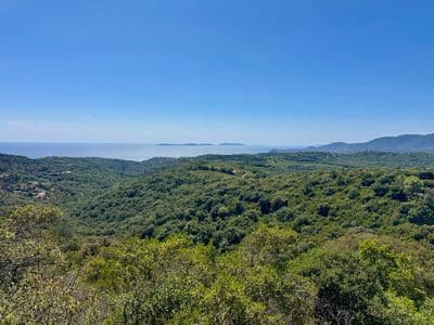 View from the mill near Ramatuelle across the wooded Maures to the sea