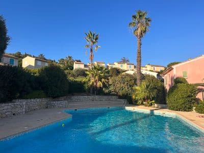 The pool in front of the house, the stone terraces of the slope behind